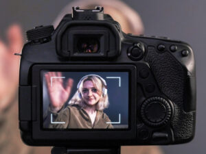 Young content creator girl is filming herself